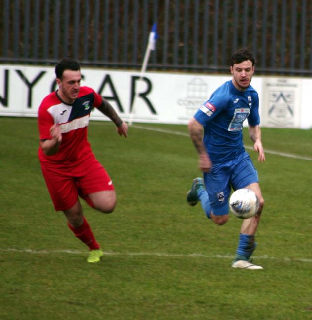 Leon Luby presses forward for Haverfordwest County